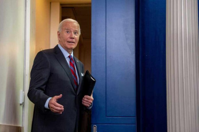 U.s.,President,Joe,Biden,Turns,Around,To,Joke,With,A
