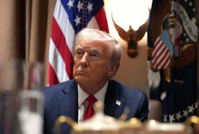 U.s.,President,Donald,Trump,Listens,During,A,Cabinet,Meeting,At