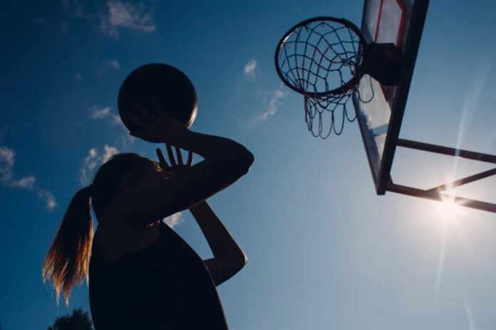 Young,Woman,Basketball,Player,Playing,Street,Ball.,Goal,Basket.