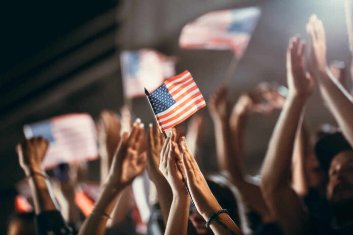 Soccer,Supporters,With,Usa,Flags,Cheering,On,Team,Success.,Group