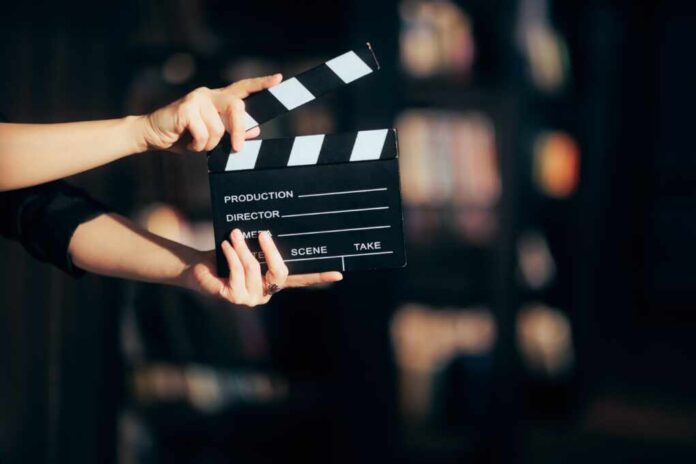 Hands,Holding,A,Film,Slate,Directing,A,Movie,Scene.,Cinematography