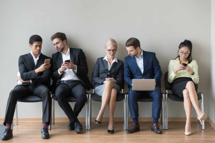 Multiethnic,Work,Applicants,Busy,Using,Laptops,And,Smartphones,Preparing,For