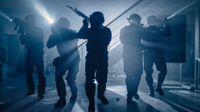 Masked,Team,Of,Armed,Swat,Police,Officers,Move,In,A