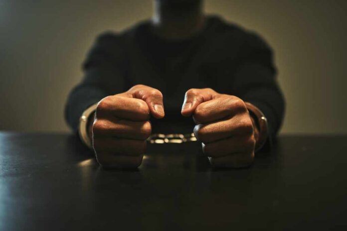 Interrogation,,Jail,And,Hands,Of,Criminal,In,Handcuffs,For,Interview,