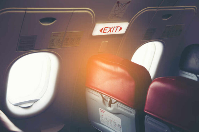 Emergency,Exit,Seat,Closeup,Shot,Of,Emergency,Exit,Door,In