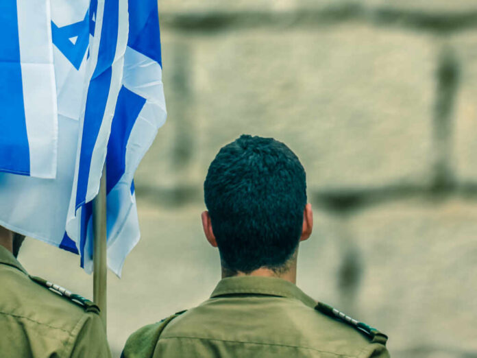 Israeli,Soldiers,With,Flag,Of,Israel,On,Blurred,Background,Of