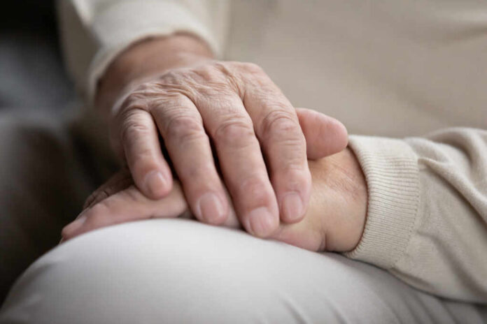 Close,Up,Of,Elderly,Male,Sitting,Alone,Keeping,Wrinkled,Work-weary