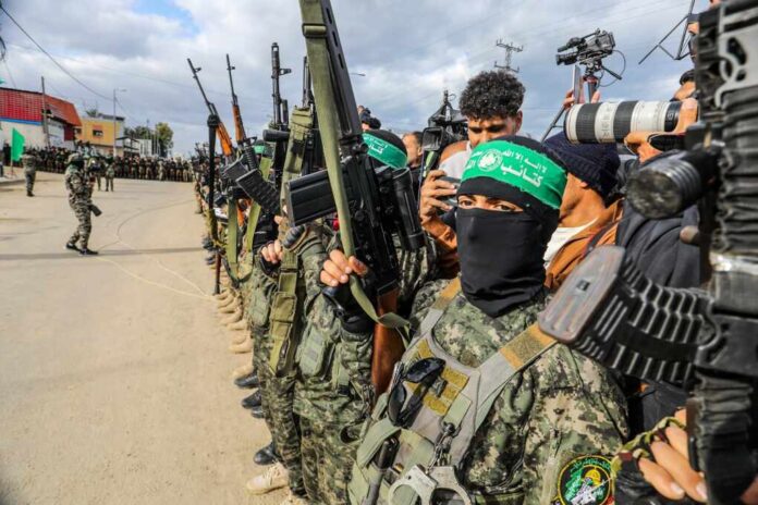 Al-qassam,Brigades,During,The,Handover,Of,Israeli,Prisoners,To,The