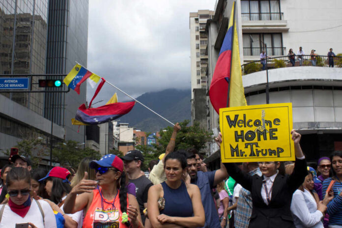 Caracas/venezuela,-,January,30,,2019:,Protesters,Hold,Banners,Welcoming,Donald