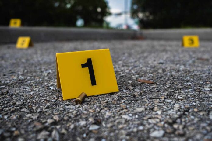 A,Group,Of,Yellow,Crime,Scene,Evidence,Markers,On,The