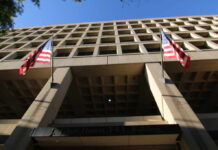 Ex-FBI Agents Sue Over Controversial Kneeling