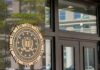 FBI seal displayed on the exterior of a government building