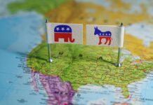 Flags representing the Republican and Democratic parties on a map of the USA