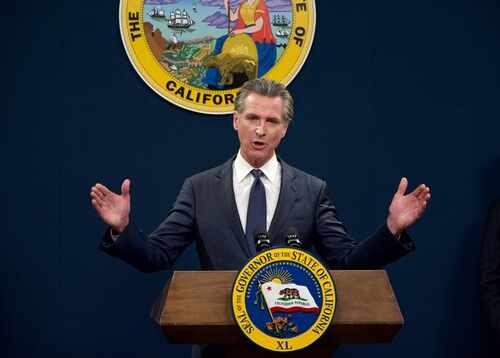 California governor delivering a speech at a podium