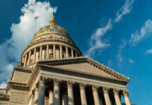 Close-up view of the dome of the West Virginia State Capitol against a blue sky