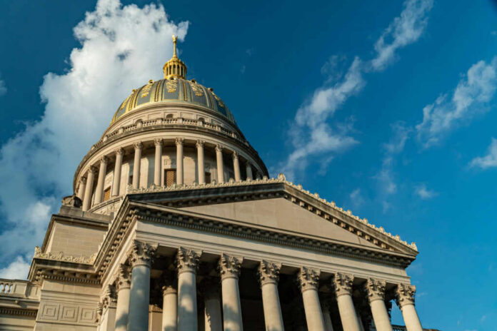 Close-up view of the dome of the West Virginia State Capitol against a blue sky