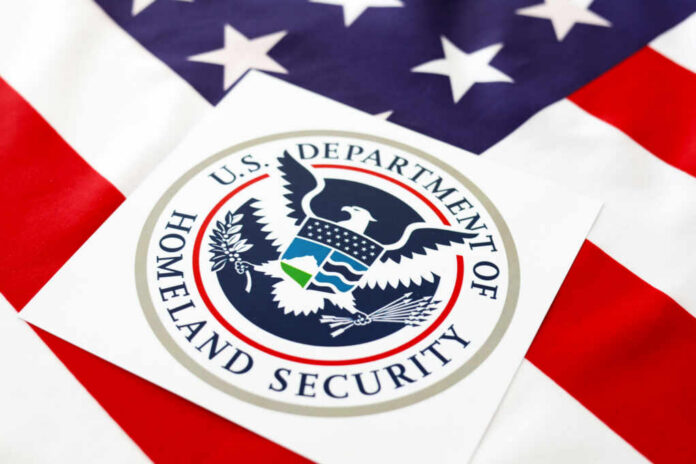 Department of Homeland Security seal on an American flag background