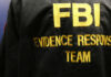 Close-up of an FBI Evidence Response Team jacket with gold lettering