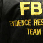 Close-up of an FBI Evidence Response Team jacket with gold lettering