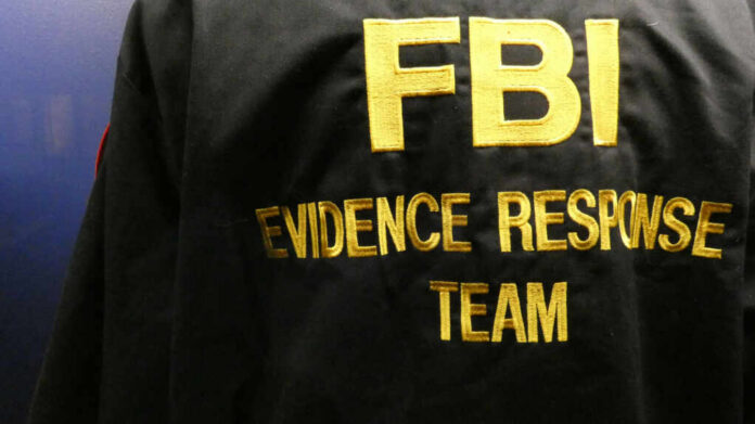 Close-up of an FBI Evidence Response Team jacket with gold lettering