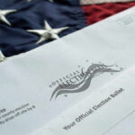 An official election ballot placed on an American flag background