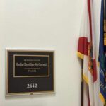Congresswoman Dodges Punishment With Surprise Exit Plaque displaying the name of Representative Sheila Cherfilus-McCormick in a government office