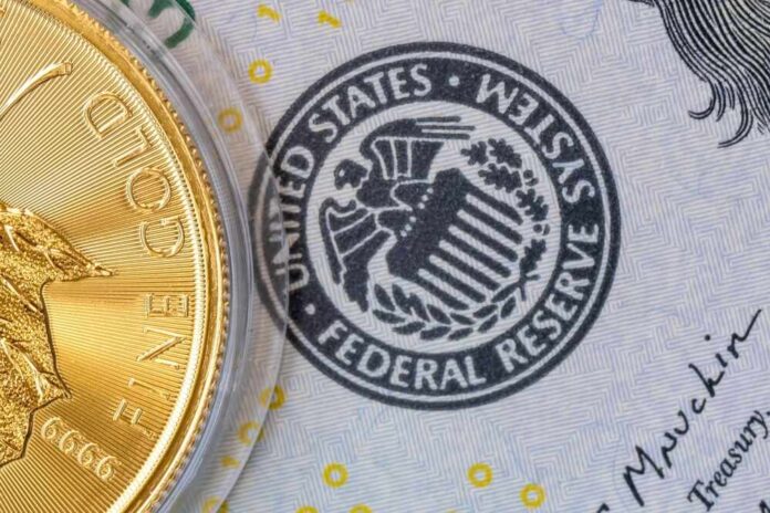 Close-up of a gold coin next to a US dollar bill