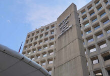Missing Homeless Report Fuels Accountability Storm HUD headquarters concrete tower and curved federal building facade