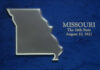 Missouri state outline on blue textured background