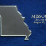 Missouri state outline on blue textured background