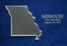 Missouri state outline on blue textured background