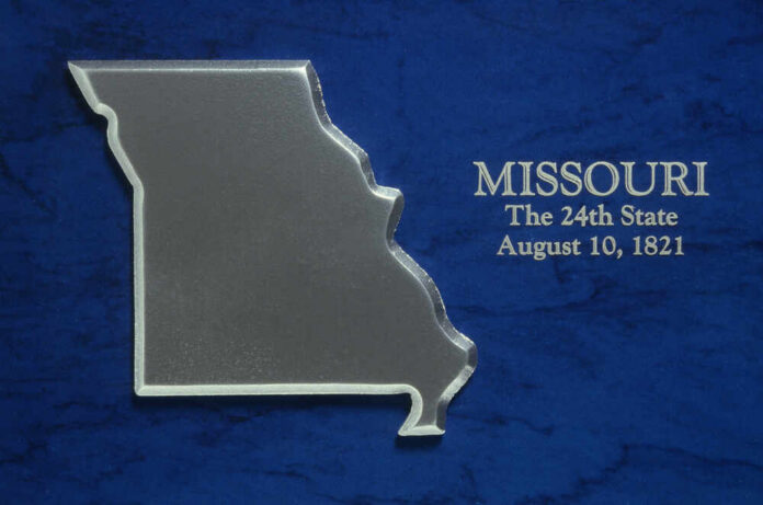 Missouri state outline on blue textured background