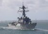 A naval destroyer sailing in the ocean