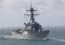 A naval destroyer sailing in the ocean