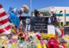 ASSASSINATION Audio Turned Into FASHION Trend—Outrage! A memorial site with flowers, balloons, and a large photo honoring Charlie