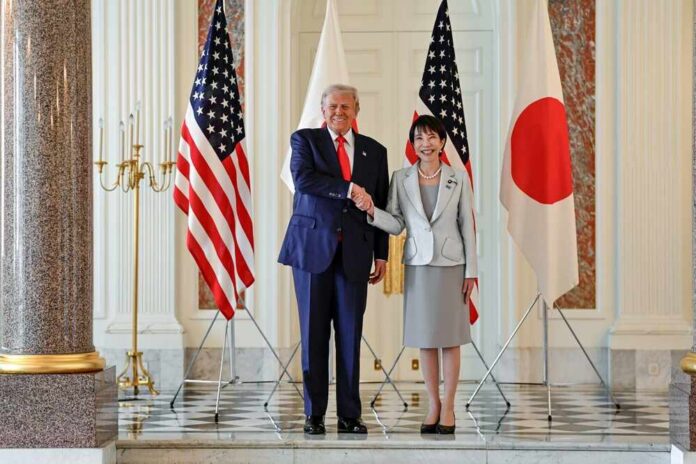 Akasaka,Palace,In,Tokyo,,Japan.,October,28,,2025,President,Donald Two political leaders shaking hands in front of flags