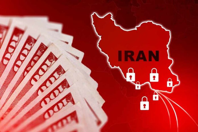 A stack of hundred dollar bills with a map of Iran and padlocks