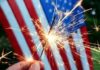 Governor Announces Emergency Fireworks Ban Statewide Sparkler held in front of an American flag