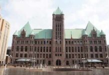 Office of the Attorney General building facade with metal sculpture