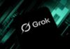 Smartphone screen showing the Grok logo on a dark tech-themed background