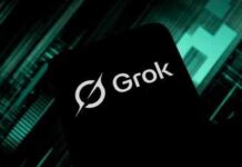 Military Bets On AI — Brace For Fallout? Smartphone screen showing the Grok logo on a dark tech-themed background