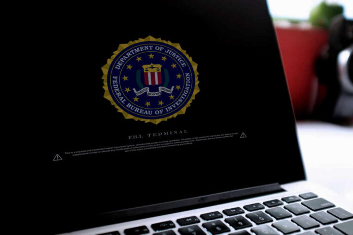 shutterstock_1562734477 Close-up of a computer screen displaying the FBI logo and a security warning