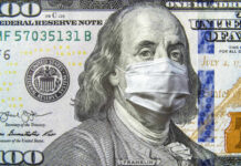A hundred dollar bill featuring Benjamin Franklin wearing a face mask