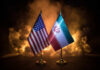 Flags of the United States and Iran displayed together