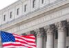 SCOTUS Slams Alabama’s ‘Cruel’ New Execution Facade of a United States courthouse with an American flag in the foreground