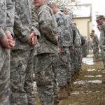 Law-And-Order Gamble Ignites Legal Firestorm A line of soldiers in military uniforms standing outdoors in formation