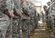 Law-And-Order Gamble Ignites Legal Firestorm A line of soldiers in military uniforms standing outdoors in formation