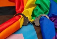 NYC Playground Assault Ignites Hate-Crime Fight A group of people interacting with police officers in an urban environment