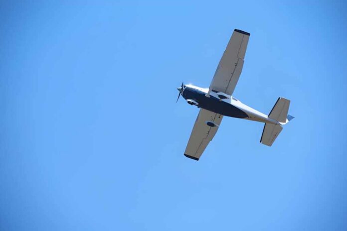 Jet fighter flying in clear blue sky
