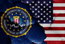 Election Investigation Rocks The FBI FBI emblem partially obscured by a cracked wall with an American flag background